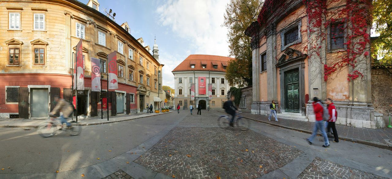 The City Museum of Ljubljana facade in the background, with the Križanke church facade on the right, 2006
