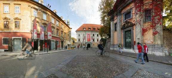 The City Museum of Ljubljana facade in the background, with the Križanke church facade on the right, 2006