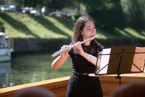 Ana Votupal partaking in a series of classical music concerts held at the Ljubljanica river, <!--LINK'" 0:1382-->, 2016