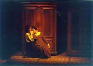 <i>Cricket in the Fist</i> by Muzeum Theatre, staged at the VIBA Studio, St. Joseph's Church, 1994. "The image simbolizes theatrical and art historical iconography as a time machine travelling back into middle age, to the gesture of the written word." Performing: <!--LINK'" 0:797--> and <!--LINK'" 0:798-->
