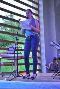 <!--LINK'" 0:845-->, a translator, reading Rivera's poems at the Museum of Baroque in Šmarje pri Jelšah, <!--LINK'" 0:846--> 2015