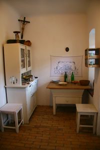 Inside a preserved miners cottage, showing the social situation of miners in the last 100 years, <!--LINK'" 0:134-->