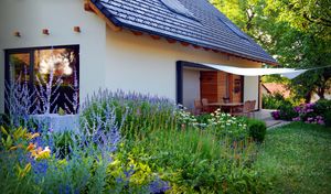 A new house with a garden that combines traditional and modern motifs, set up by <!--LINK'" 0:434-->, Ljubljana surroundings, 2010