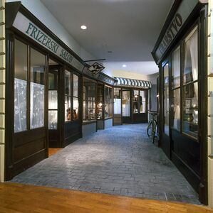 the second floor of the permanent exhibition <i>Living in Celje</i> shows historical recreations of streets artisans craft shops, market and the middle-class housing, <!--LINK'" 0:746-->