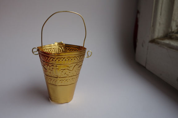 A model of the bronze situla from Vače (500 BC), a pedagogical kit from the Dolenjska Museum Novo mesto, made by a visitor at the Cultural Bazaar (2014)