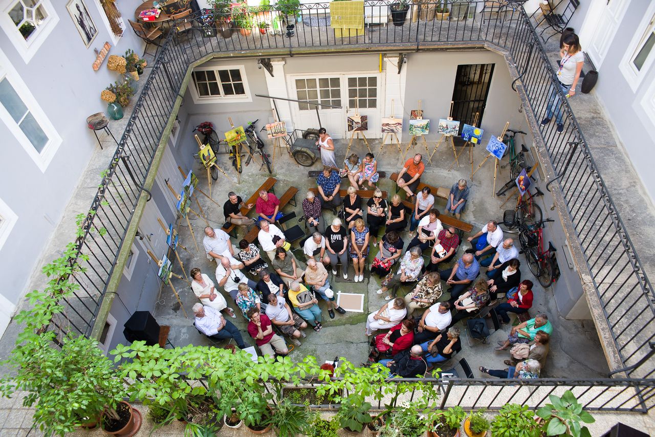 House! Society for People and Spaces 2017 Reading poetry in one of the city's courtyards.jpg