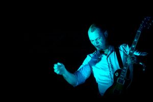 <!--LINK'" 0:475-->, <!--LINK'" 0:476--> frontman, performing at the <!--LINK'" 0:477--> 2012