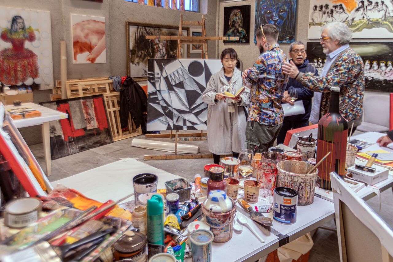 Artists and guests inside the creative workspace at a residency of the ART CIRCLE International Visual Arts Festival 2024.