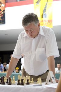 Grandmaster Anatoly Karpov as a special guest at a simultaneous chess party at the <!--LINK'" 0:286--> 2008
