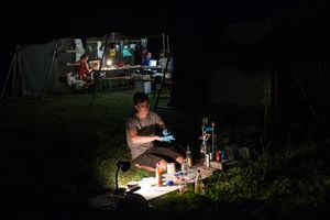 Jakob Scheithe developing his Fortune Telling Machine, A bio-hacked urin fortune teller, at the <!--LINK'" 0:874--> 2018.