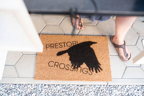 Festival merchandise (doormat) at Crossings Festival, 2021