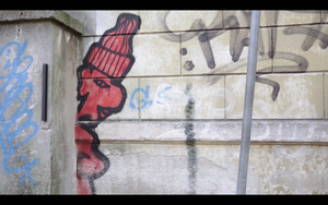A still frame from the <!--LINK'" 0:437--> promo video featuring grafitti in Ljubljana, 2013