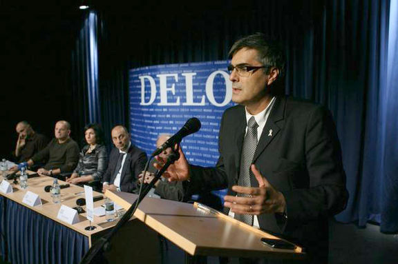 Delo Newspaper hosting a round table, 2010