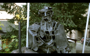 A still frame from <!--LINK'" 0:91--> promo video featuring a bust of <!--LINK'" 0:92-->, the leading Slovene Impressionist painter and patron of arts. A public sculpture created by <!--LINK'" 0:93--> in 1969 is located in front of the <!--LINK'" 0:94-->. Shot in 2013.