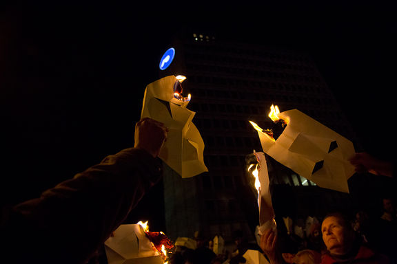 Paper masks as a rally prop at the Protestivals in the streets of Ljubljana in 2013