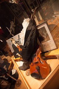 An autograph of Stefan Milenković, a Serbian child prodigy and famous concert violinist, his first violin and a frock coat. Part of the Philographic Collection of the <!--LINK'" 0:229--> at Ana's Mansion, 2012