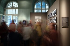 An opening ceremony at the <!--LINK'" 0:155--> in Ljubljana. A temporary exhibition presented <!--LINK'" 0:156-->'s photo documentation, 2014.