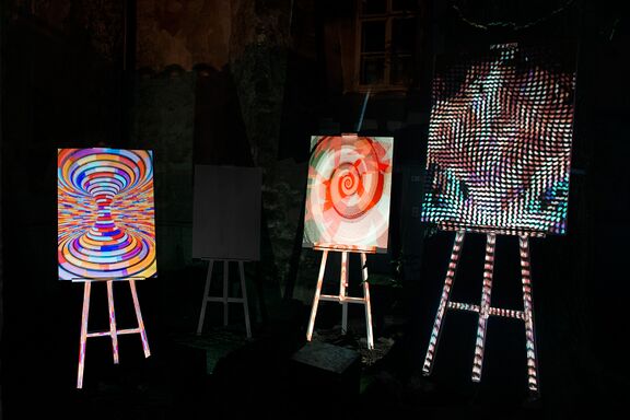 The project by students of the Secondary School for Design and Photography, Ljubljana - a spatial installation In a Vortex with light charting and adapted optical illusions. 23rd Lighting Guerrilla Festival, Ljubljana. Author: DK