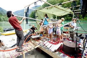 Music workshop for children with Slovenian multi-instrumentalist <!--LINK'" 0:317--> at <!--LINK'" 0:318--> in 2015. Author: Iztok Zupan