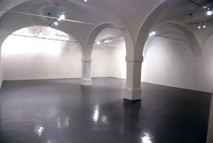<!--LINK'" 0:537-->, situated since 1984 in a renovated courtyard building at Gregorčičeva 3, Ljubljana, built in the early 18th century,and also used circa 1809 as stables for Napoleon's army